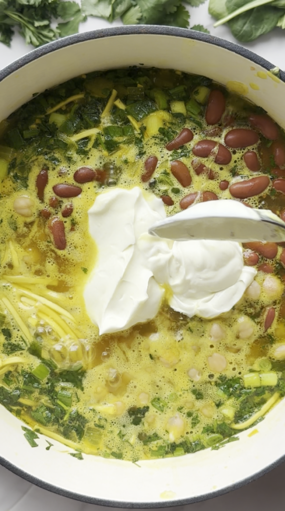 yogurt mix being poured into aush/ash pot